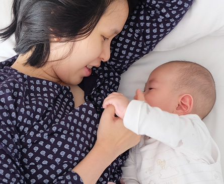 Baby Holding Mother's Finger